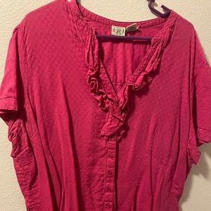 Textured pink blouse with ruffled neckline